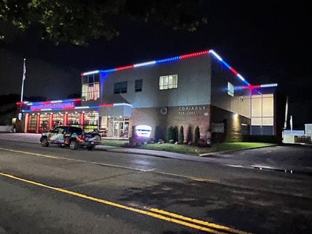Permanent roofline lighting installed by Island Nights Outdoor Lights on Long Island